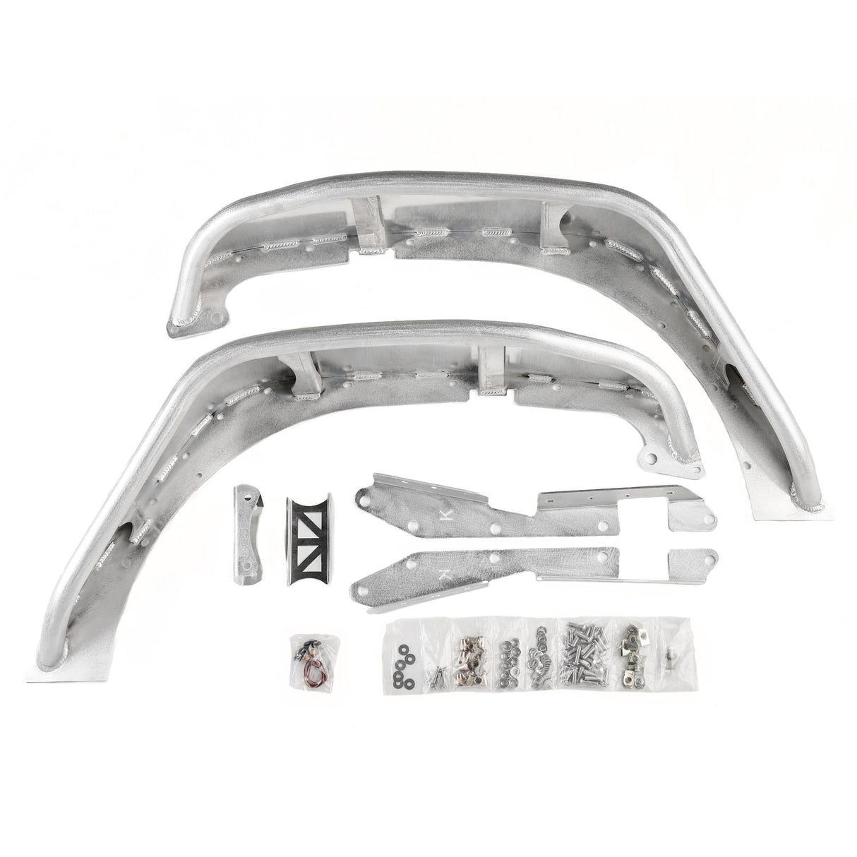 A complete set of raw aluminum front fender flares for Jeep Wranglers, showcasing their natural metal finish. The kit includes pre-drilled fender flares, mounting brackets, and a full set of installation hardware such as bolts, washers, and screws, neatly packaged in plastic bags. The fenders also feature removable and paintable Combat Off Road logos, designed for durability, customization, and off-road performance.