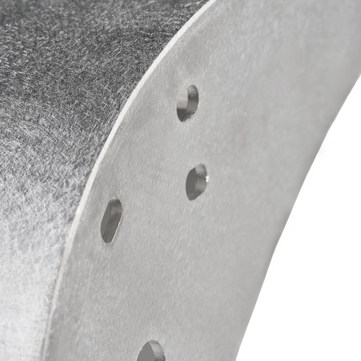 Close-up view of the mounting edge of a raw aluminum rear fender flare for a Jeep Wrangler. The image highlights the natural metal finish and pre-drilled holes for easy and precise installation. Designed for durability and customization in off-road environments.