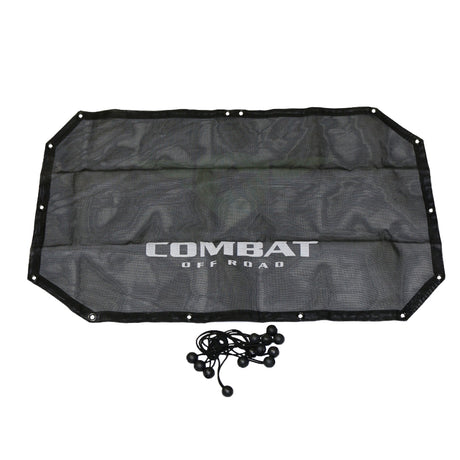 A black mesh sunshade designed for a 2-door Jeep JK, featuring the Combat Off Road logo printed in white across the center. The sunshade provides UV protection while allowing airflow, and it includes reinforced edges with metal grommets for secure attachment. A set of black bungee cords with ball ends is included for easy installation onto the roll bars.