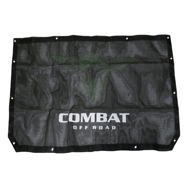 Combat Off Road sunshade designed for the 2-door Jeep JL. The sunshade is constructed from durable black mesh material, providing shade while maintaining airflow inside the vehicle. Features the Combat Off Road logo printed in white for branding and multiple grommets for secure attachment to the Jeep's frame. Ideal for off-road adventures and sunny weather.