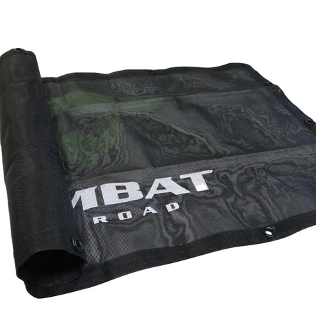 Combat Off Road sunshade designed for the 2-door Jeep JL. The sunshade is constructed from durable black mesh material, providing shade while maintaining airflow inside the vehicle. Features the Combat Off Road logo printed in white for branding and multiple grommets for secure attachment to the Jeep's frame. Ideal for off-road adventures and sunny weather.