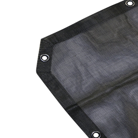 Close-up view of the Combat Off Road sunshade's corner for the 2-door Jeep JL. The durable black mesh material is highlighted, showcasing reinforced stitching for added strength. The corner features a metal grommet for secure attachment, ensuring stability and longevity during off-road use.