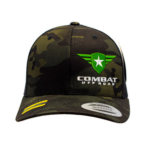 Combat Off Road black camo snapback hat with embroidered green logo and white text on the front.